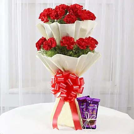 20 red carnations bouquet dairy milk silk